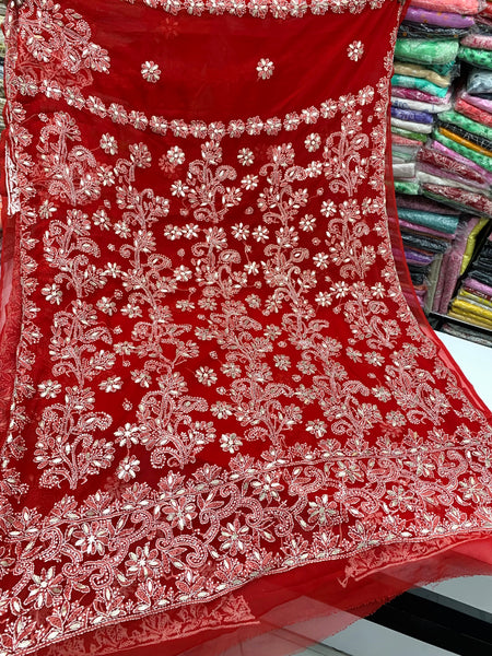 Chikankari hand-embroidered georgette saree with gottapatiwork